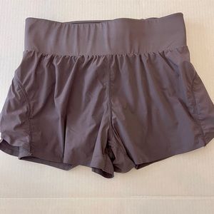 Fabletics running shorts - attached bike shorts with POCKETS - cute - size Small